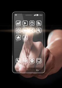 Hand pressing apps icon on a virtual screen